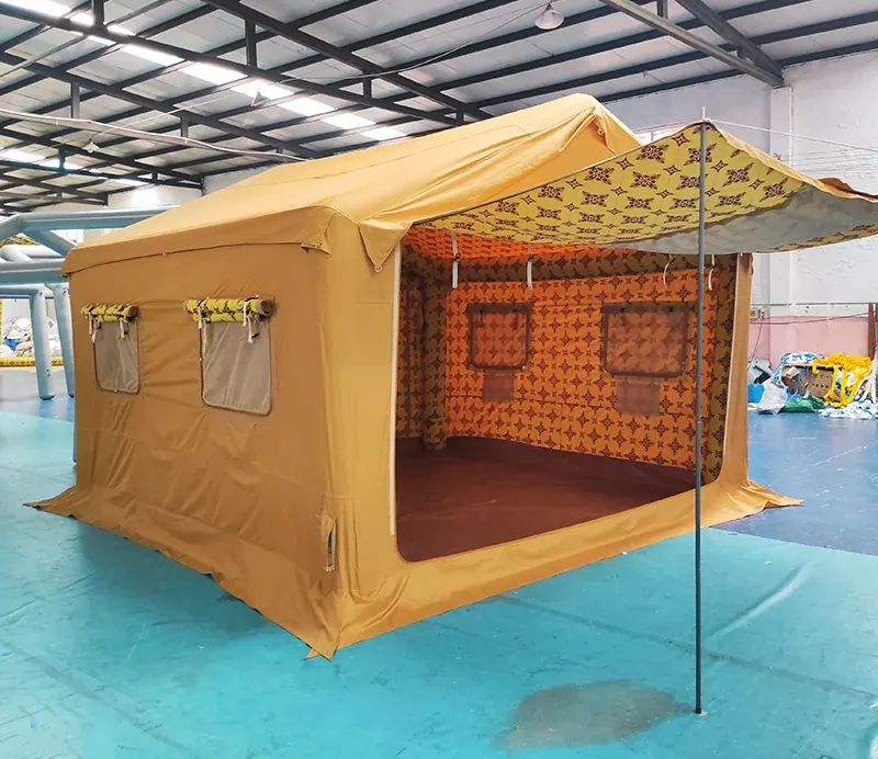 Gold-coloured inflatable shelter with yellow rolled door panels and tie cords under a steel roof