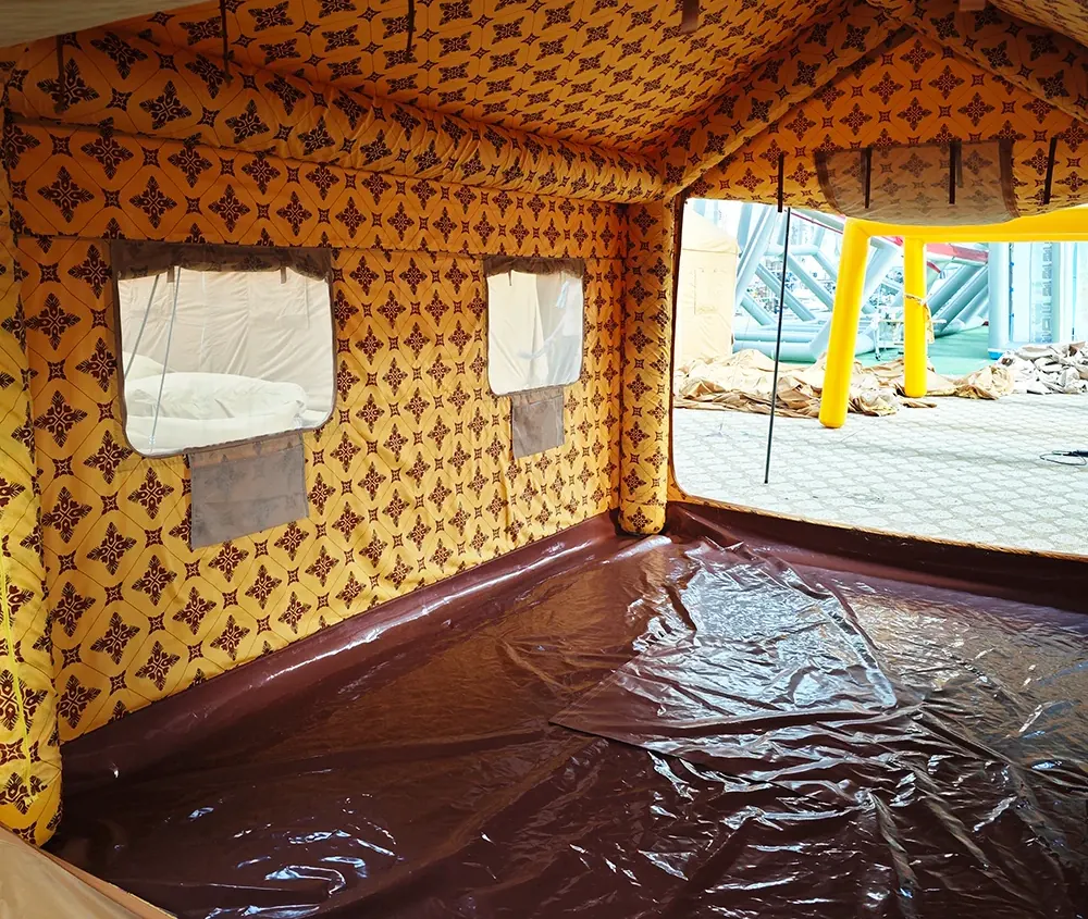 Inside a shelter with a patterned orange lining, a window opening and a light floor layer