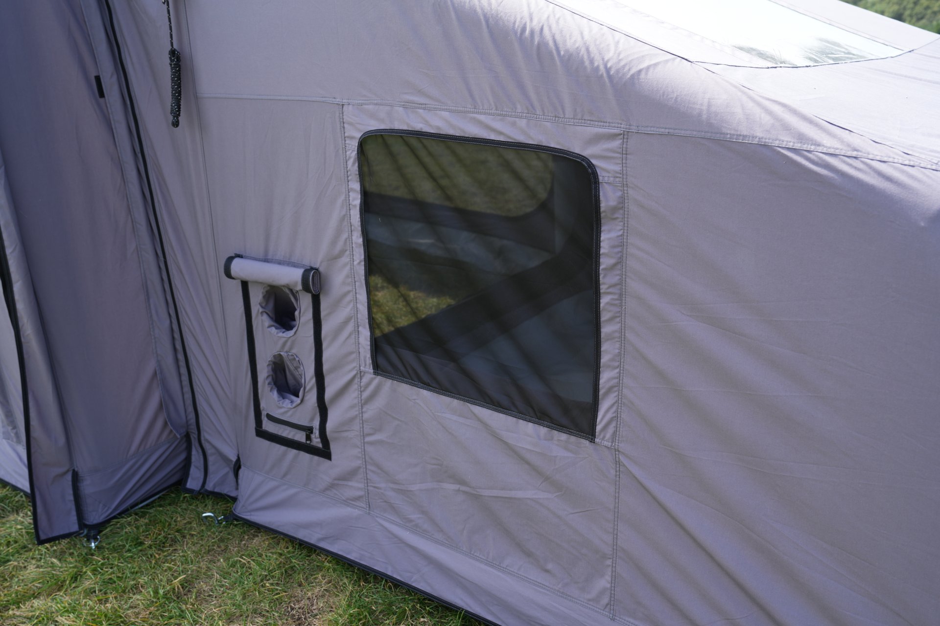 Interior fabric, floor and air-beam details of an inflatable tent